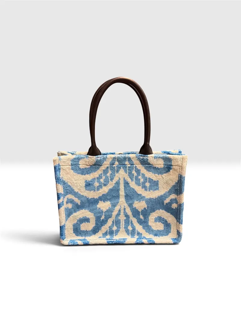 The same tote seen straight on against a plain ground