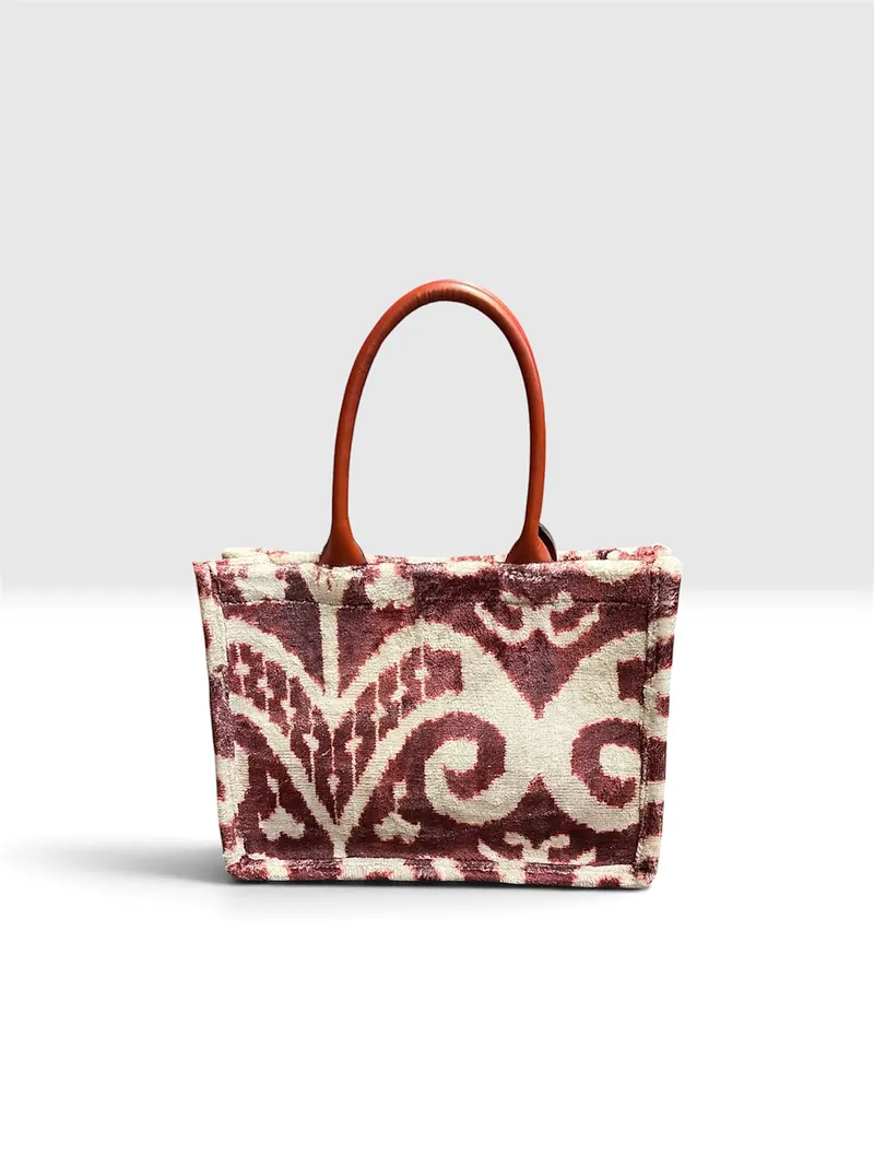 The same tote seen straight on against a plain ground
