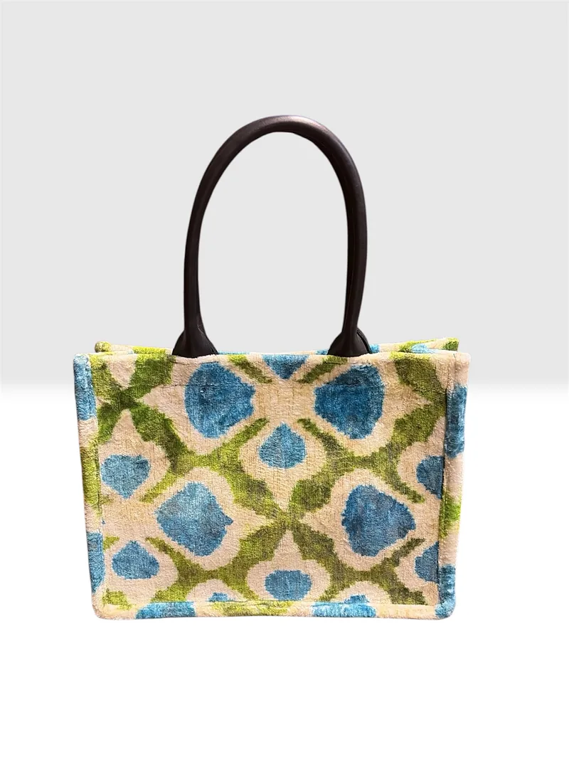 Kilim tote in a turquoise and moss garden-lattice weave on cream