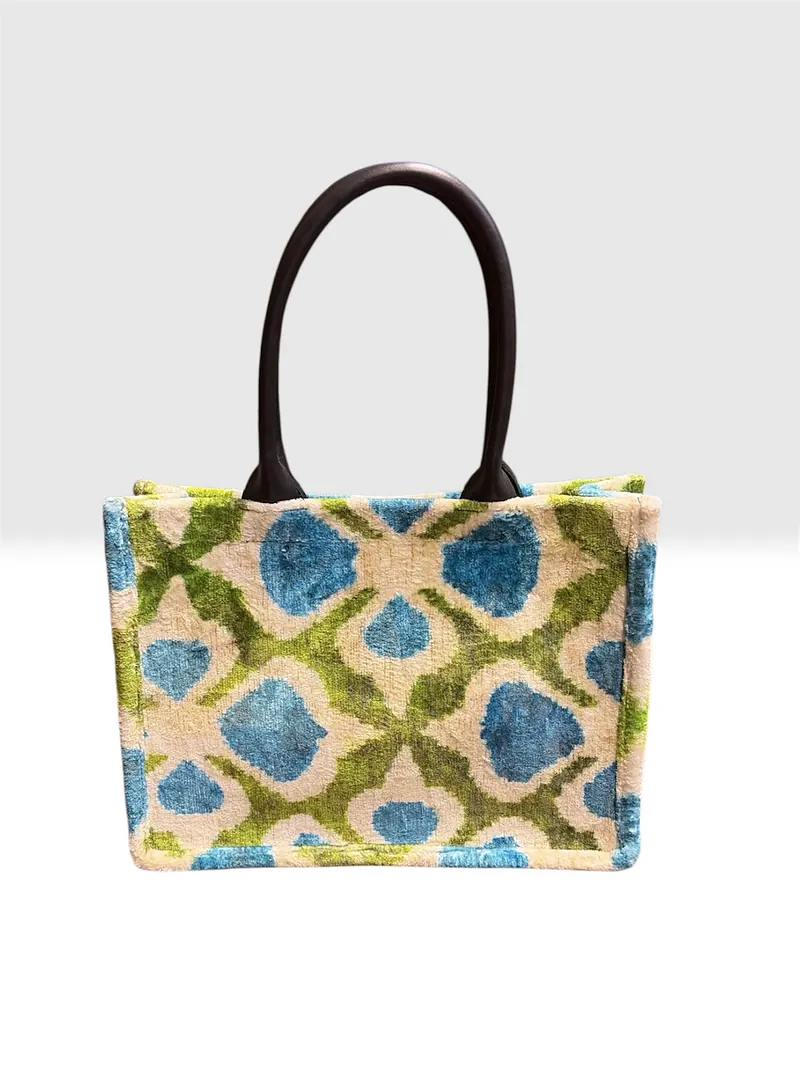 The same tote seen straight on against a plain ground